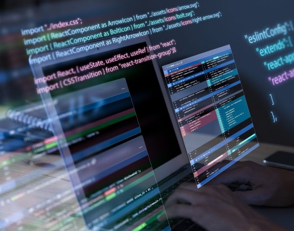 programming-background-with-person-working-with-codes-computer