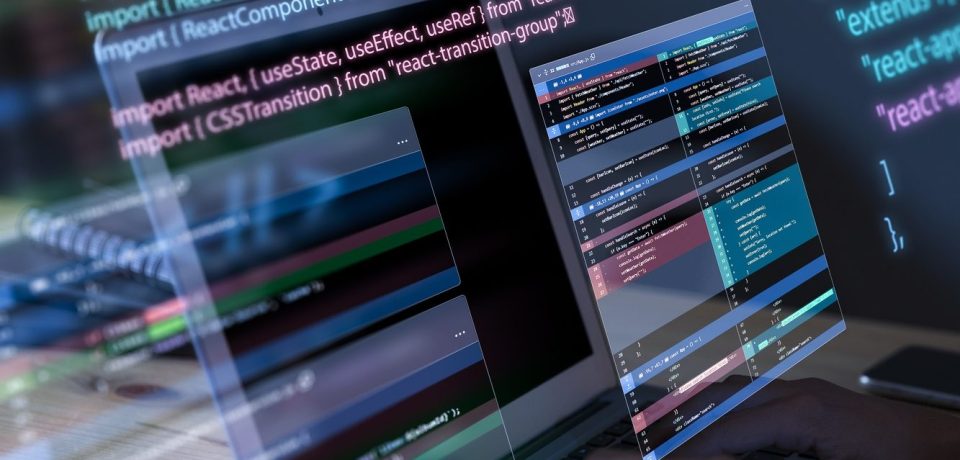programming-background-with-person-working-with-codes-computer